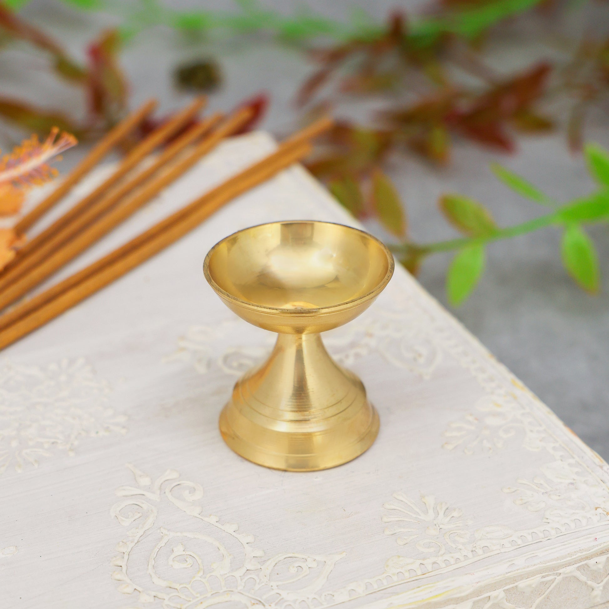 brass round diya