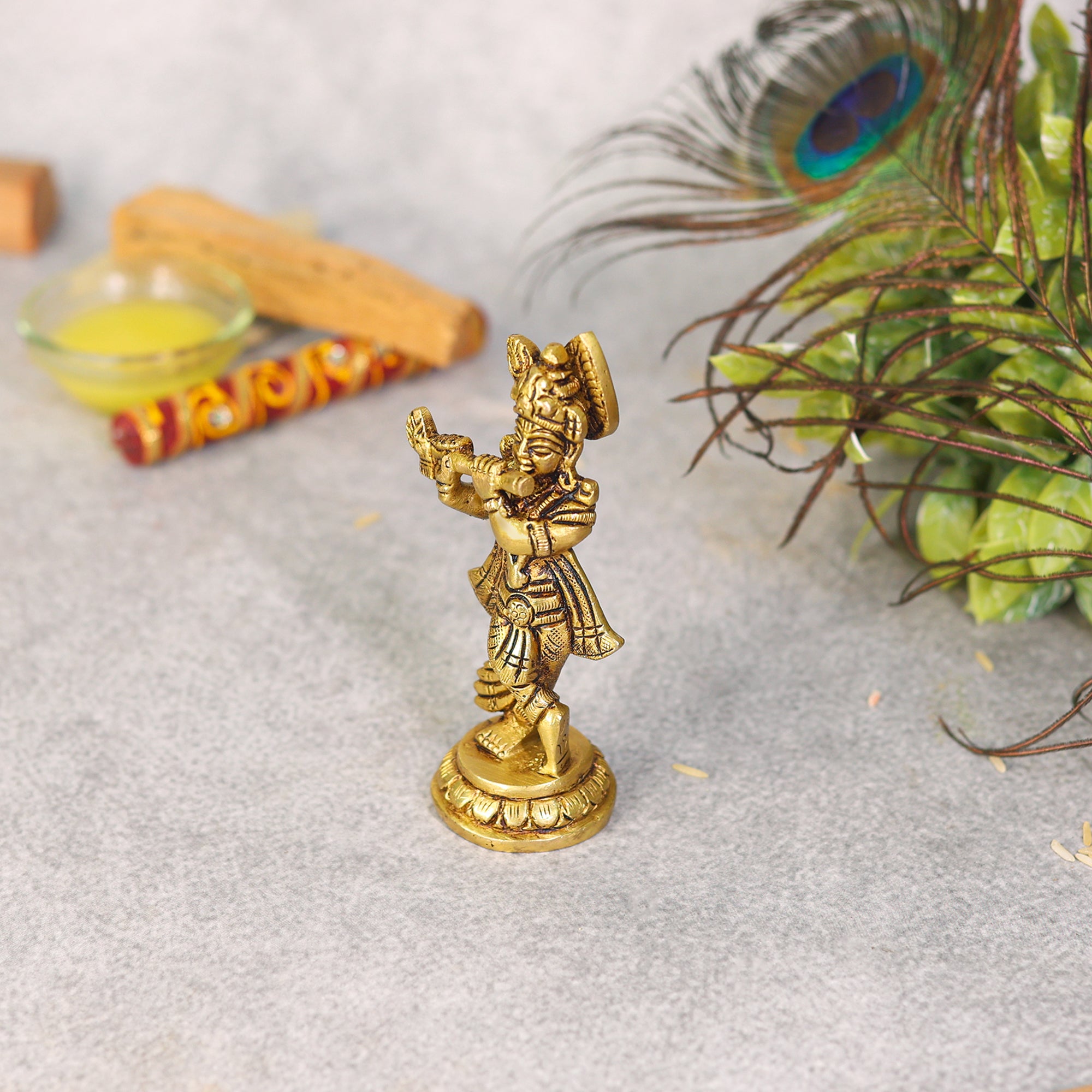brass krishna idol